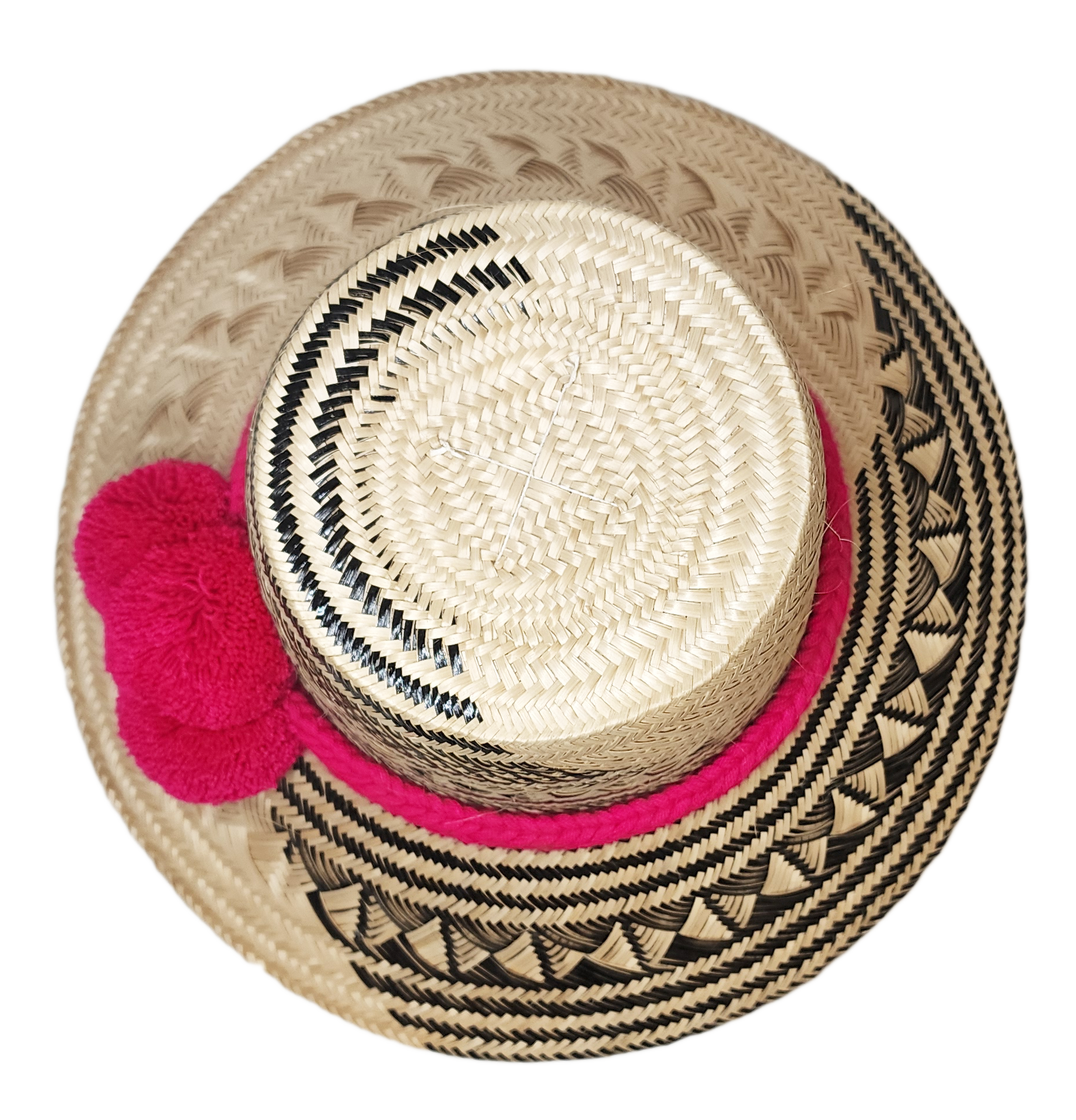 "Colorful handwoven Wayuu hat from Wuitusu, crafted with Iraca palm fibers and decorated with cultural pompoms."