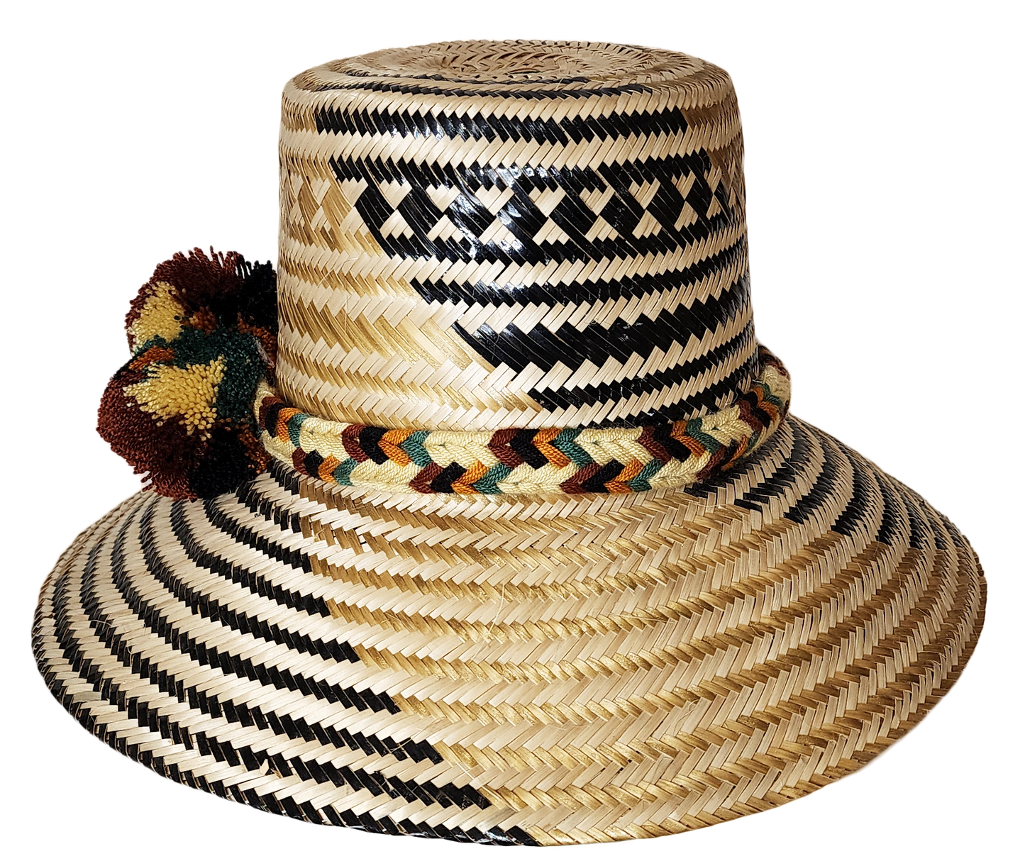 "Colorful handwoven Wayuu hat made from Iraca palm, adorned with cultural pompoms for prosperity, adjustable to fit all sizes