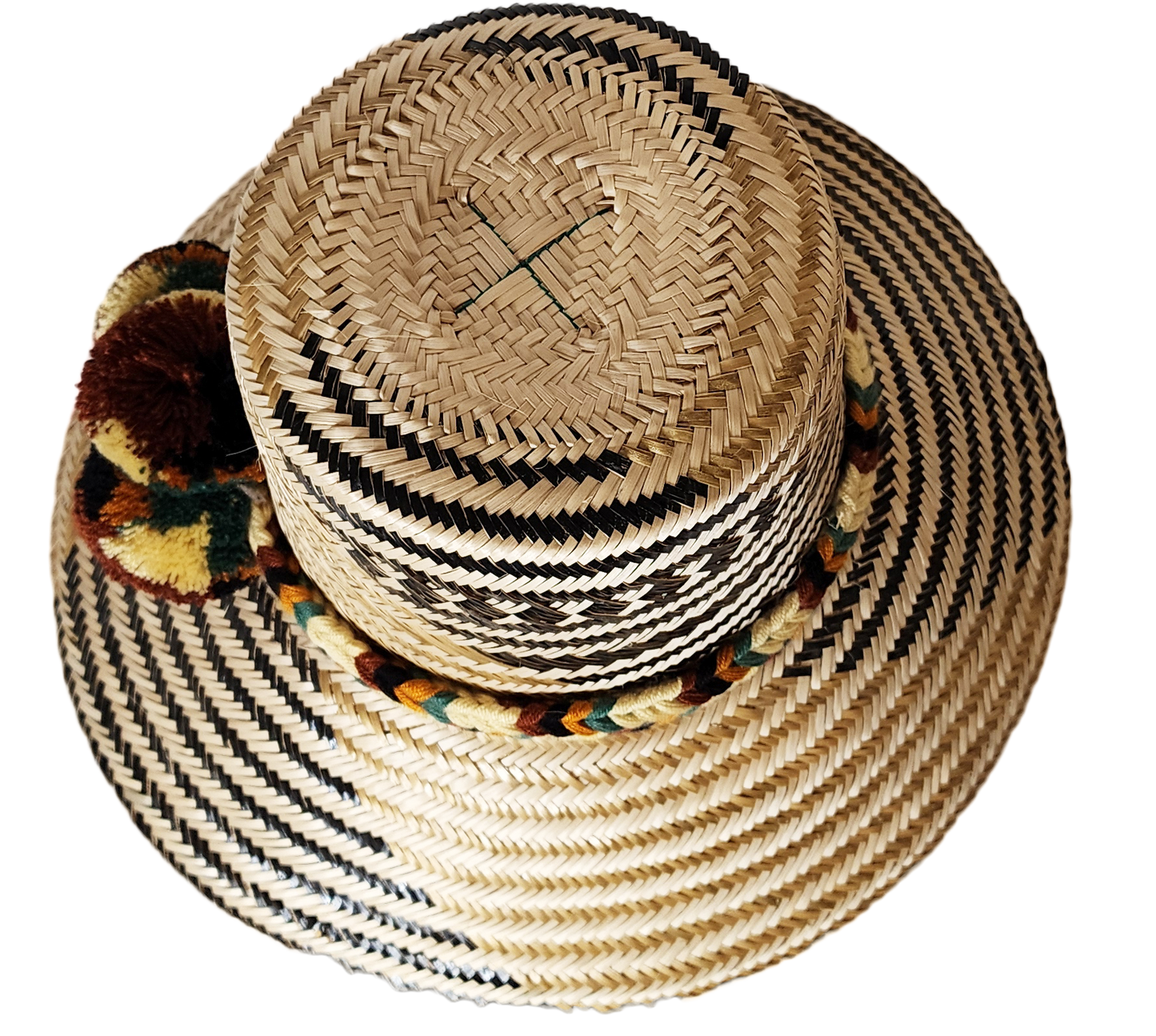 "Colorful handwoven Wayuu hat made from Iraca palm, adorned with cultural pompoms for prosperity, adjustable to fit all sizes
