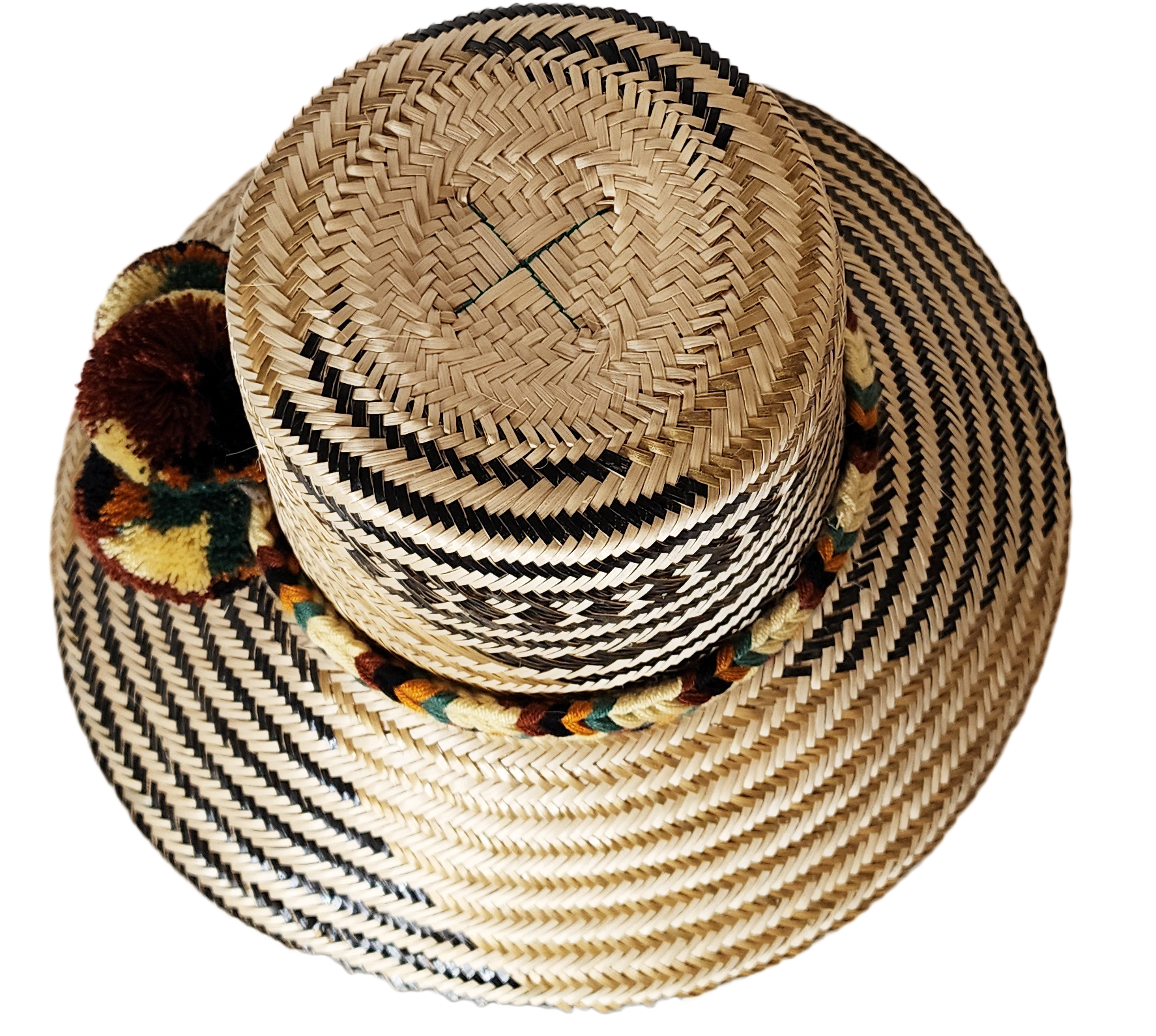"Colorful handwoven Wayuu hat made from Iraca palm, adorned with cultural pompoms for prosperity, adjustable to fit all sizes