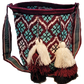 "Colorful Paleteada Crochet Wayuu Bag, handcrafted with vibrant geometric patterns, showcasing artisanal craftsmanship from C