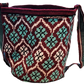 "Colorful Paleteada Crochet Wayuu Bag, handcrafted with vibrant geometric patterns, showcasing artisanal craftsmanship from C