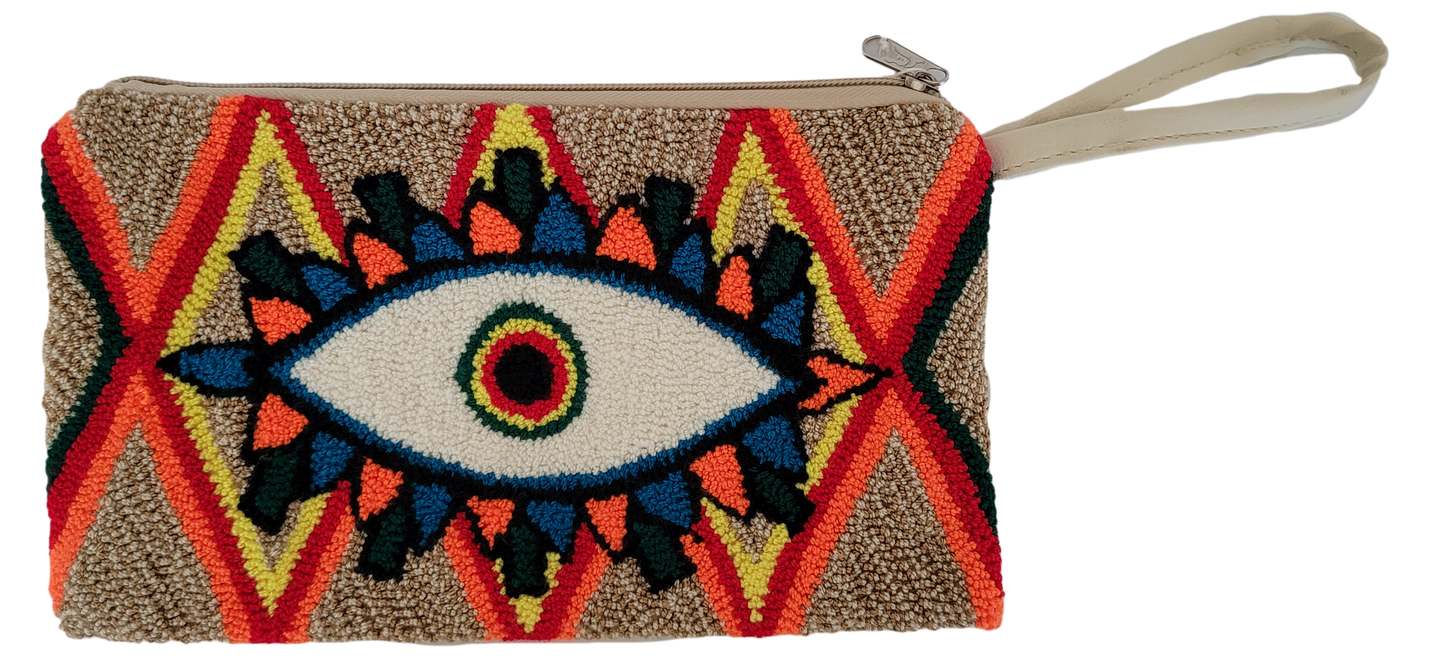 Boho chick punch needle clutch featuring colorful eye motif on beige background

