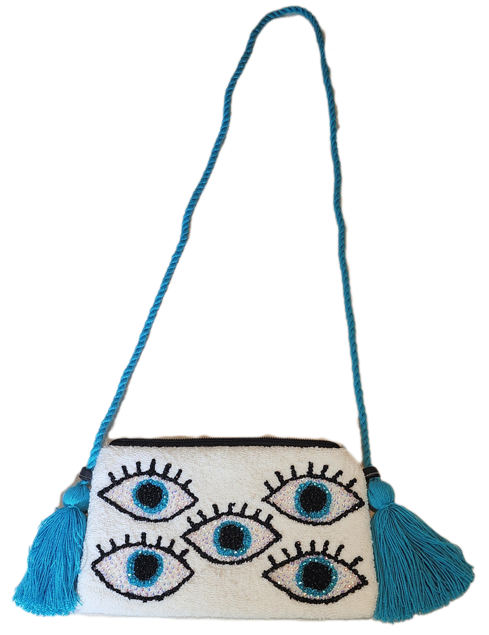 1 "Colorful Wayuu clutch with intricate crochet patterns and crystal embellishments, handcrafted by the Wuitusu collective."