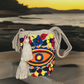 Boho-chick style punch needle bag in vibrant tones