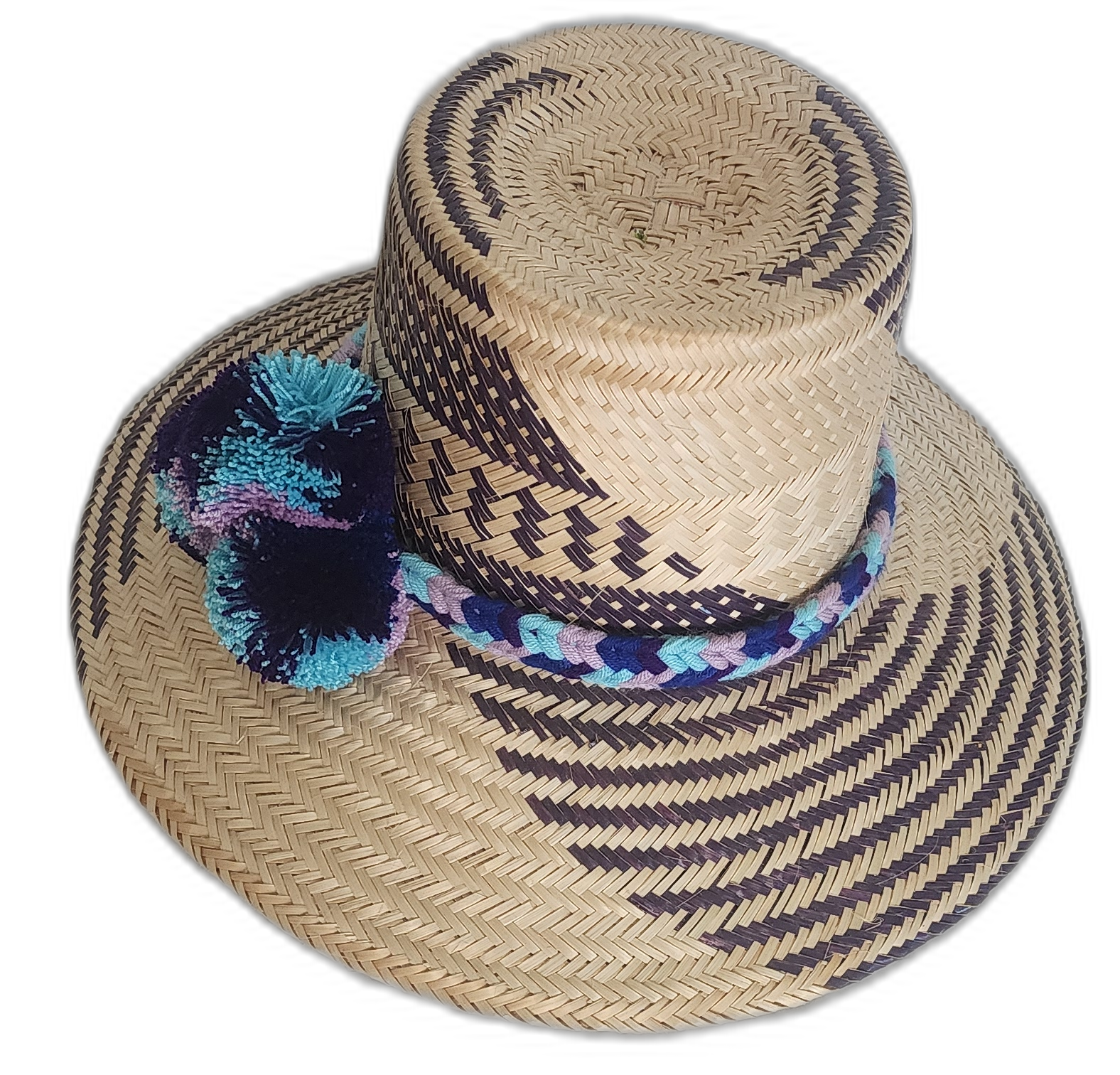 Bohemian hat featuring navy and lavender weave with bold pompoms