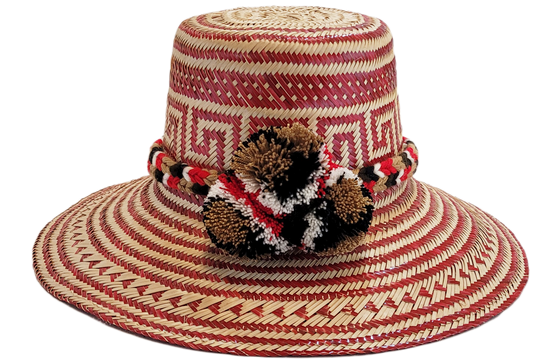 "Colorful Wayuu hat, handwoven from Iraca palm fibers by artisans, adorned with meaningful pompoms for style and cultural sig