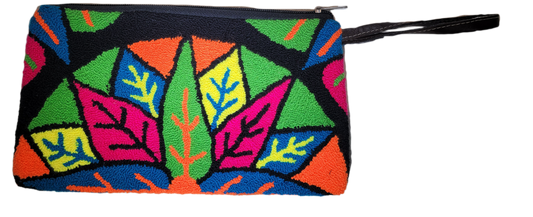 "Colorful Wuitusu Artisan Needle Punch Clutch, handcrafted by Wayuu artisans, featuring vibrant, unique patterns and a zip cl