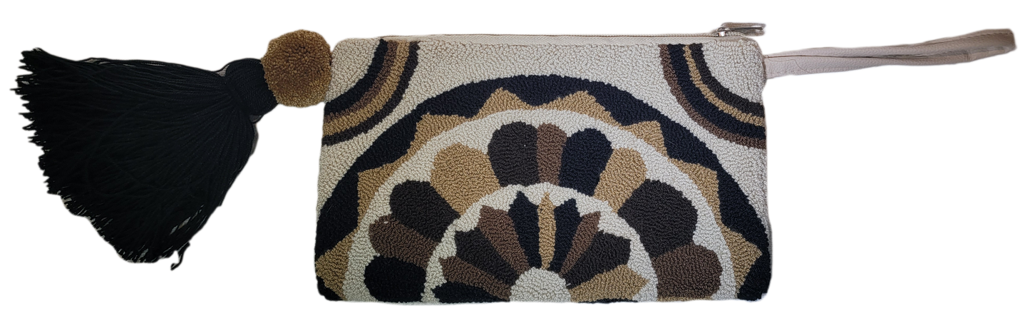 "Colorful Wuitusu Artisan Needle Punch Clutch, handmade by Wayuu artisans, featuring unique patterns and a zip closure."