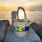 "Colorful Wuitusu Wayuu crochet bag with a short handle, showcasing vibrant, artisanal patterns and handmade by Wayuu artisan