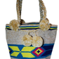 "Colorful Wuitusu Wayuu crochet bag with a short handle, showcasing vibrant, artisanal patterns and handmade by Wayuu artisan