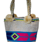 "Colorful Wuitusu Wayuu crochet bag with a short handle, showcasing vibrant, artisanal patterns and handmade by Wayuu artisan