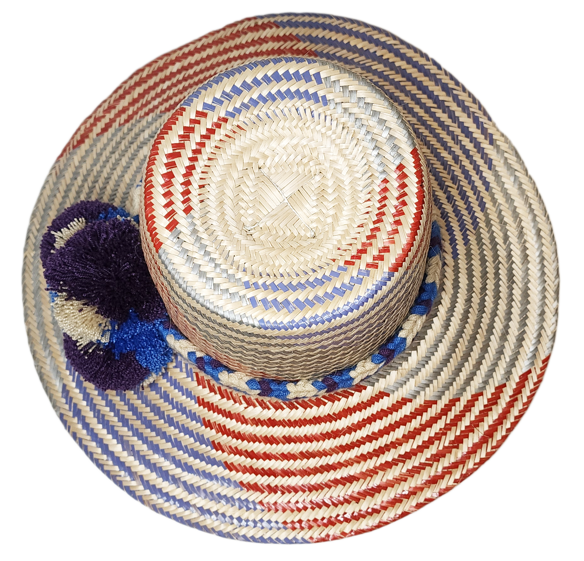 "Colorful Wuitusu Wayuu hat crafted from Iraca palm fibers, adorned with significant pompoms, versatile and adjustable fit."