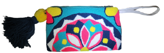 "Colorful Wuitusu Wayuu Needle Punch Clutch, handcrafted by Wayuu artisans, featuring vibrant, intricate patterns and a secur