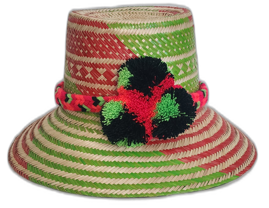 Vibrant red and green Boho straw hat handmade by Wayuu artisans