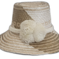 Handmade Wayuu straw hat in beige and cream with white pompoms