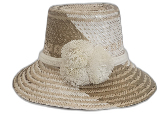 Handmade Wayuu straw hat in beige and cream with white pompoms