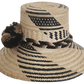 Handcrafted beach straw hat, perfect as a stylish beach hat and loved for its warm weather hat flair.
