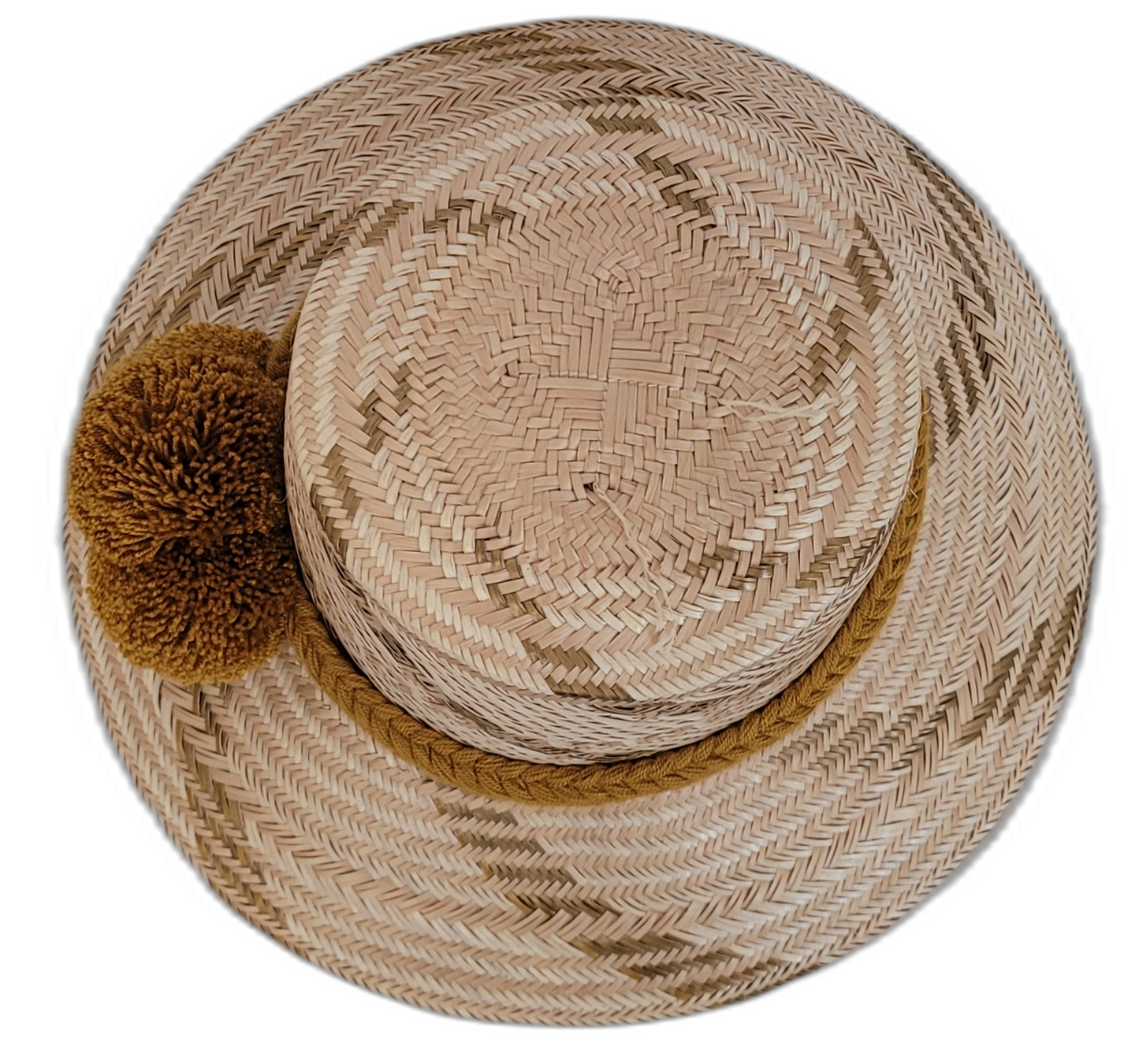 Elegant handmade straw Wayuu hat with golden-brown pompom details.

