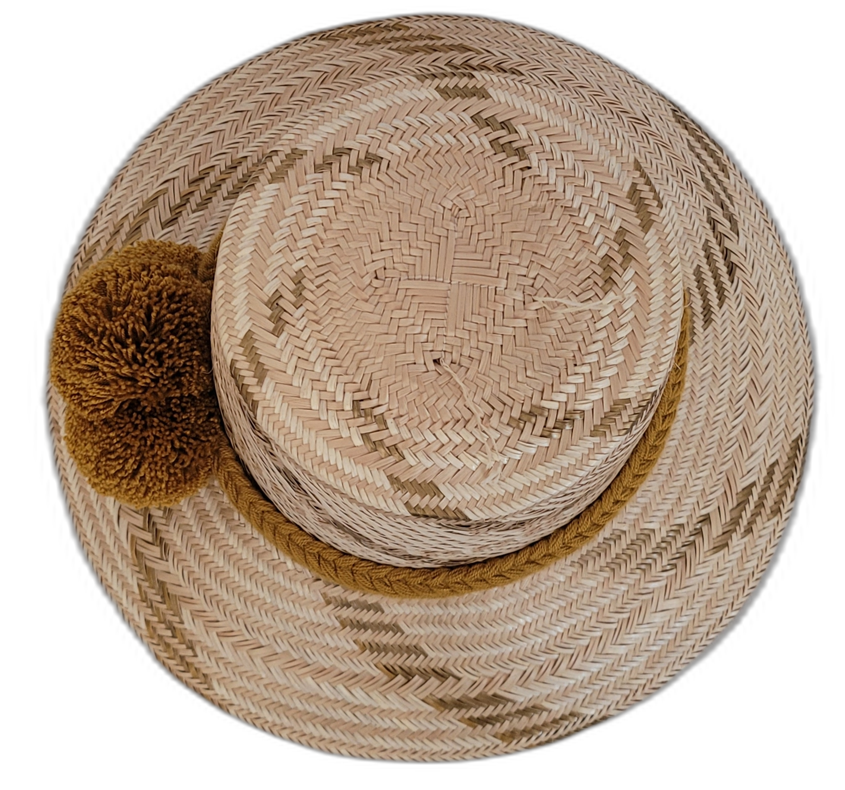 Elegant handmade straw Wayuu hat with golden-brown pompom details.

