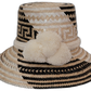 Handmade Wayuu bohemian straw hat Elisa with black and natural weave and white pompoms

