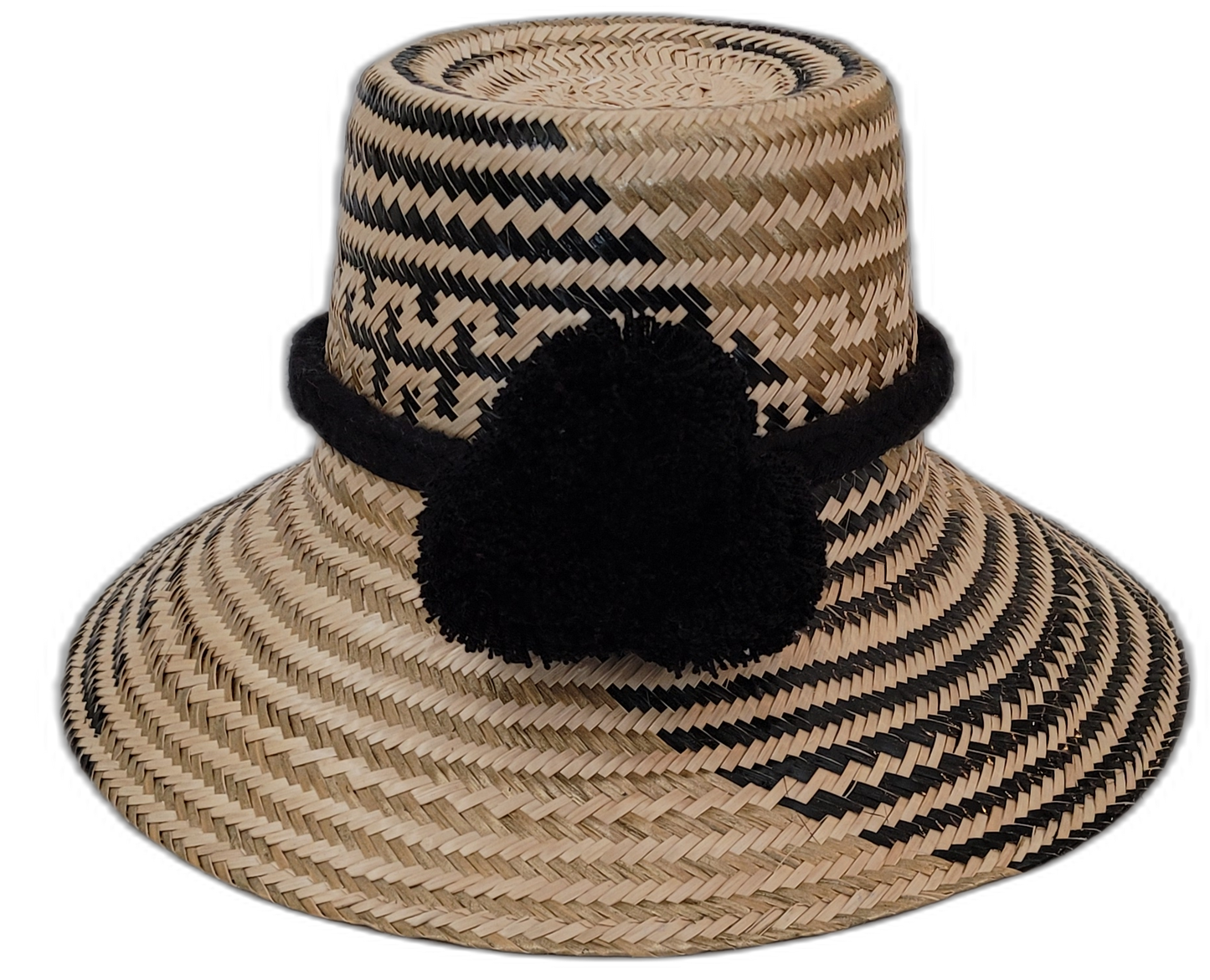 Elsie handmade Wayuu straw hat with bold black and natural palm weave and black pompom

