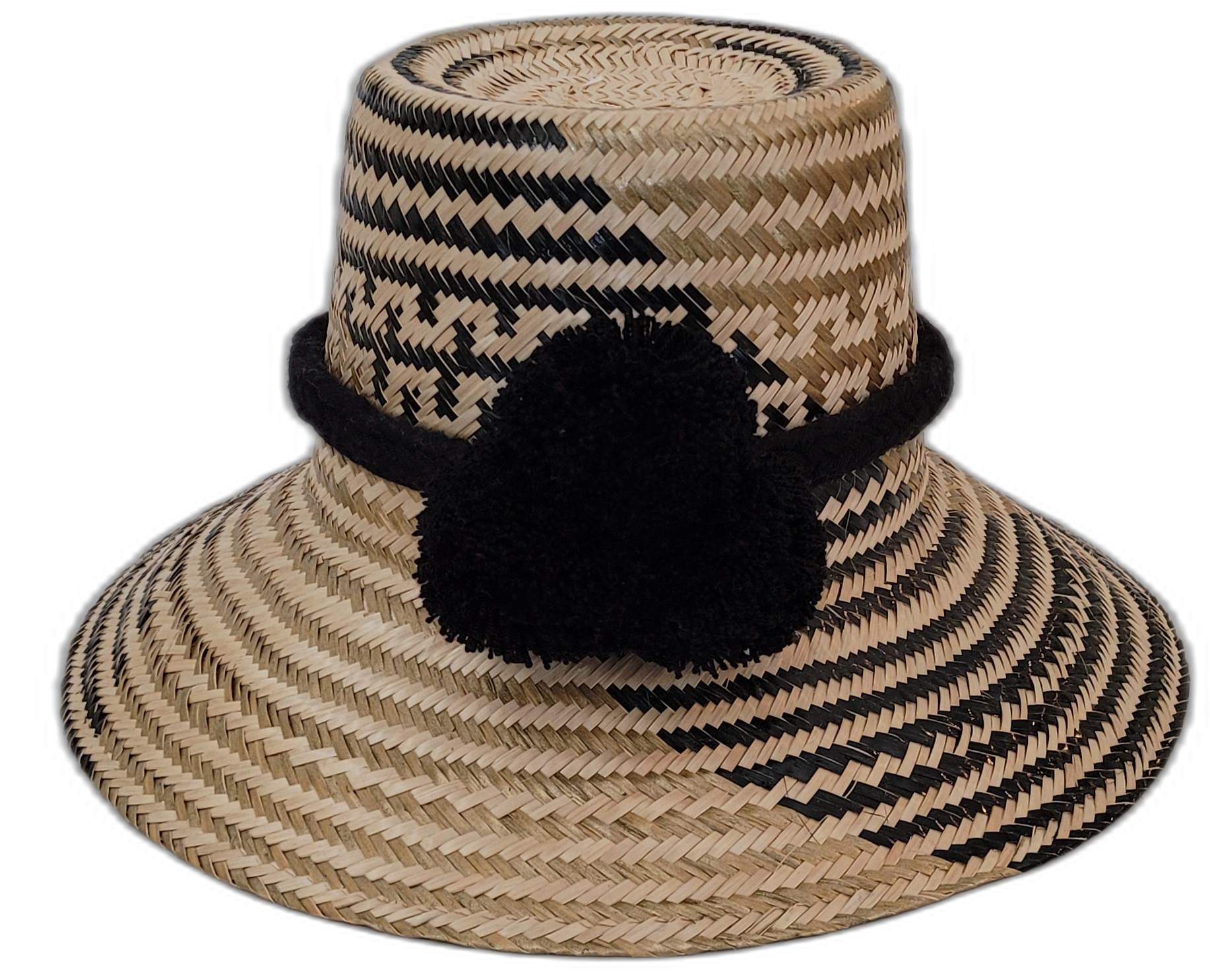 Elsie handmade Wayuu straw hat with bold black and natural palm weave and black pompom

