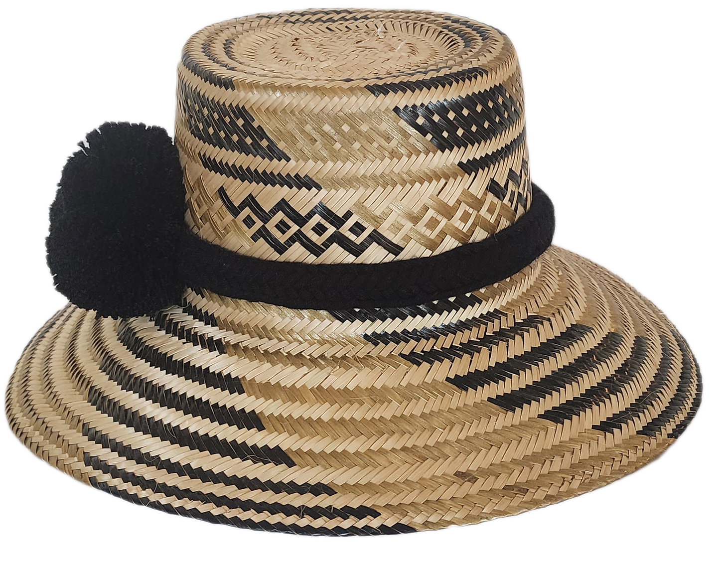 Handcrafted wide brim straw hat, perfect as a boho hat and loved for its warm weather hat flair.
