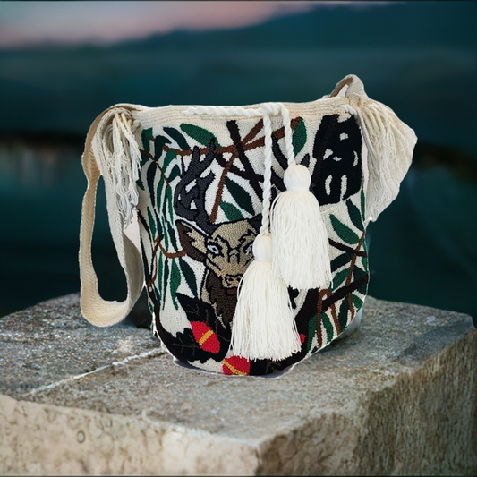 Handmade Wayuu crochet bag with deer and foliage punch-needle design