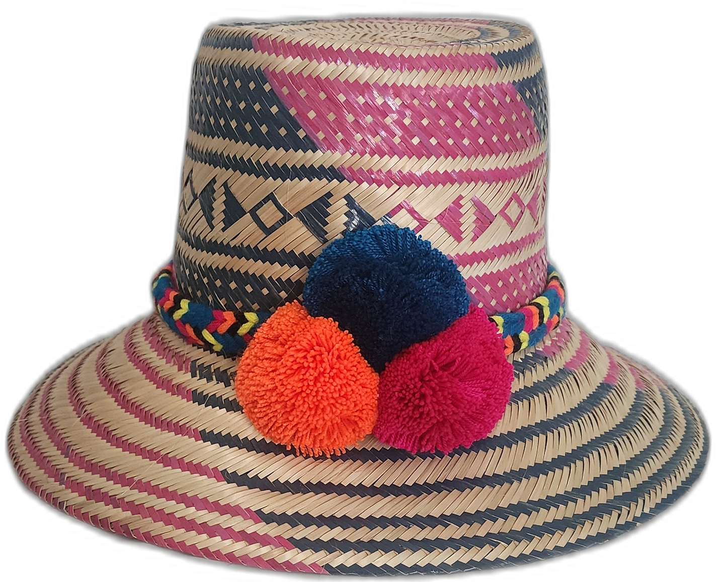 Handmade Wayuu straw hat with navy and fuchsia weave and pompoms in navy, orange, and fuchsia.

