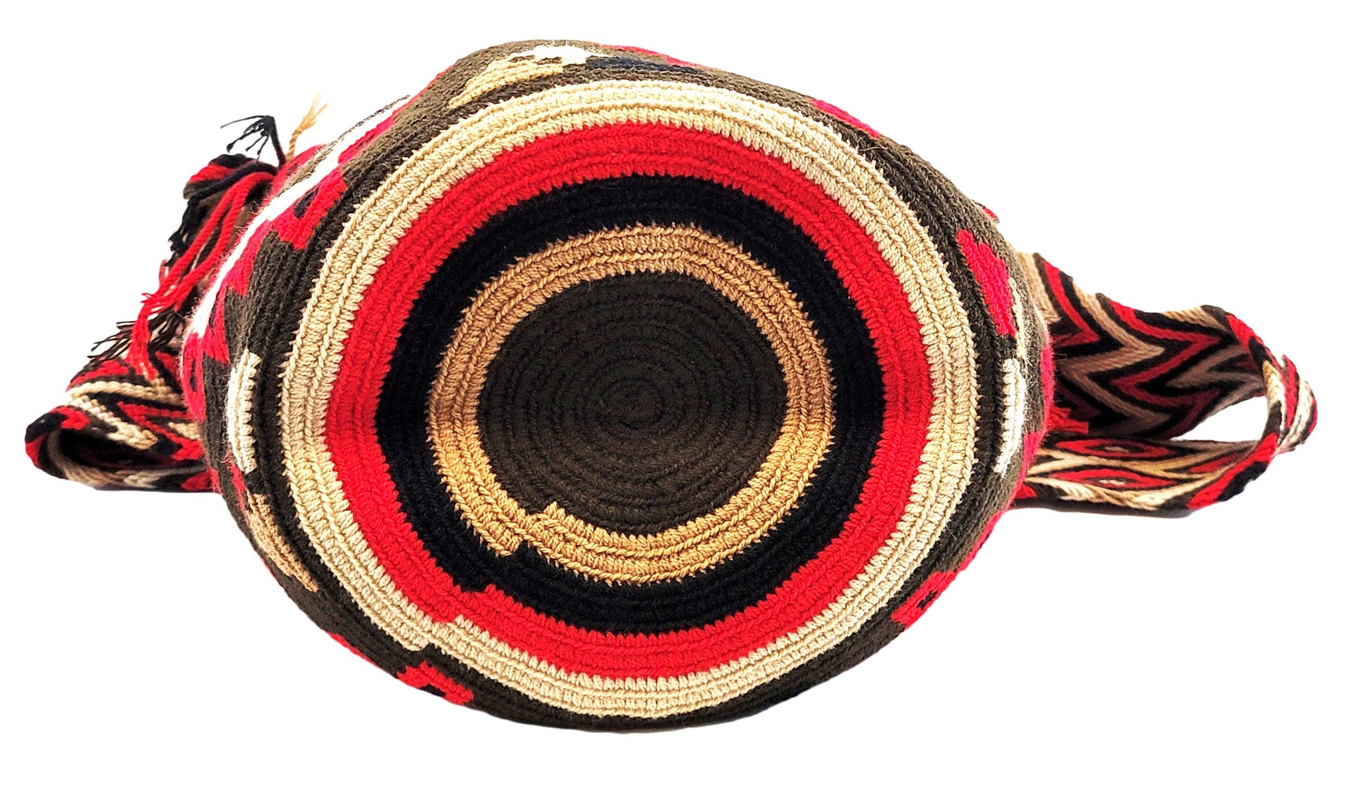 "Handcrafted crochet bags by Wayuu women, vibrant with cultural symbols and colors, supporting sustainable community growth."