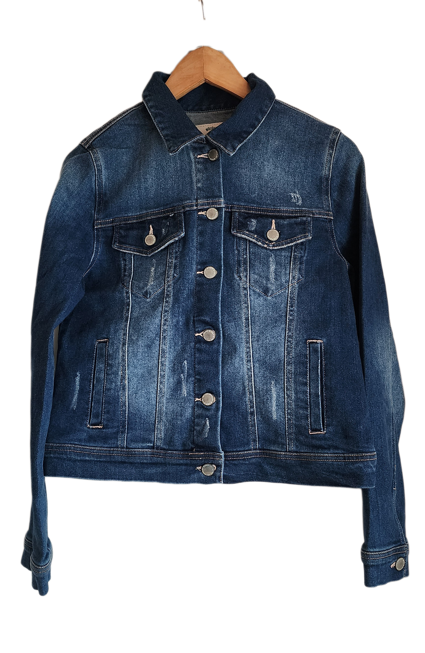 "Handcrafted denim jacket with colorful punch needle embroidery on the back, showcasing unique Wayuu-inspired patterns and fa