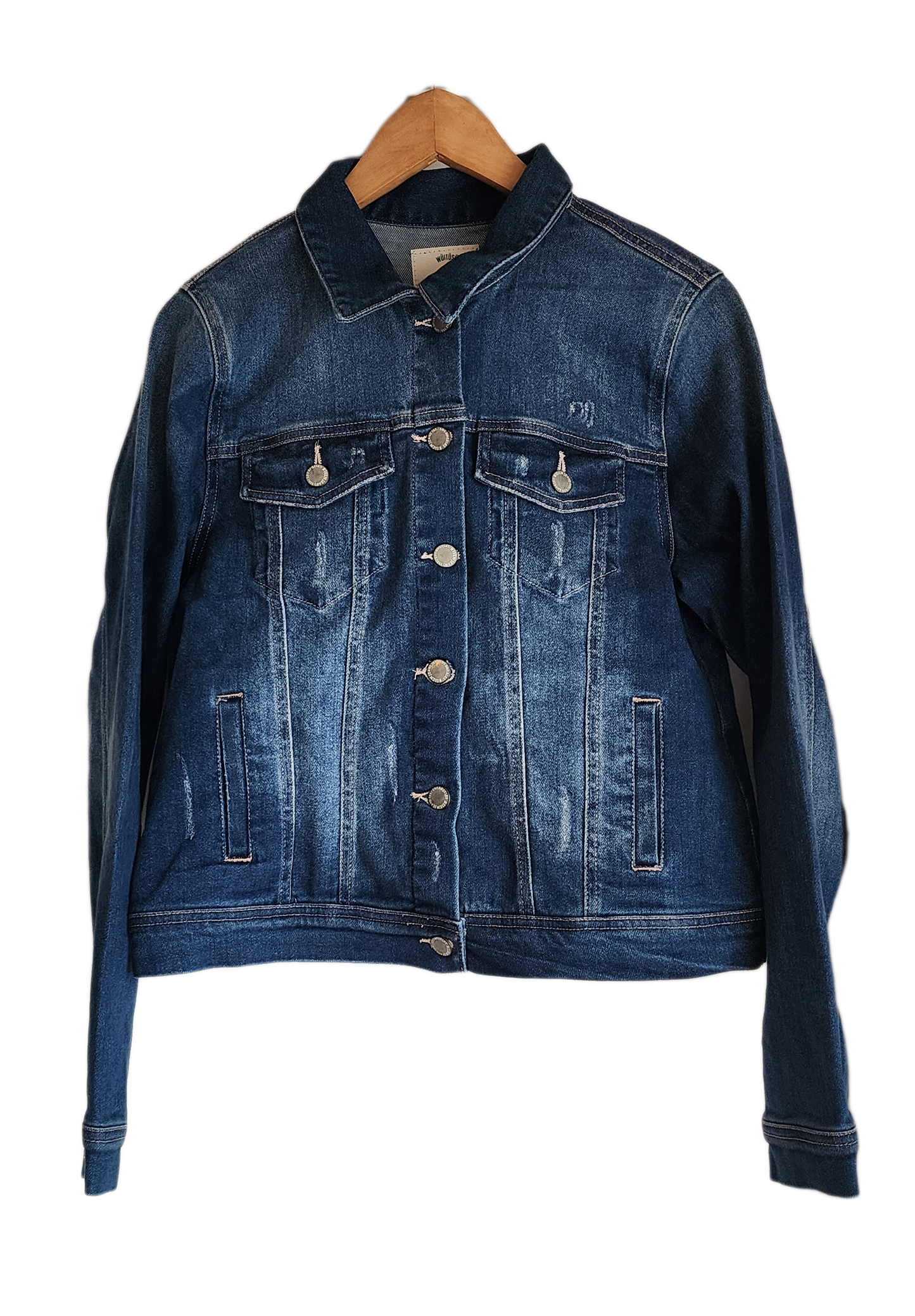 "Handcrafted denim jacket with vibrant, artisan-made punch needle embroidery on the back, showcasing unique style and craftsm