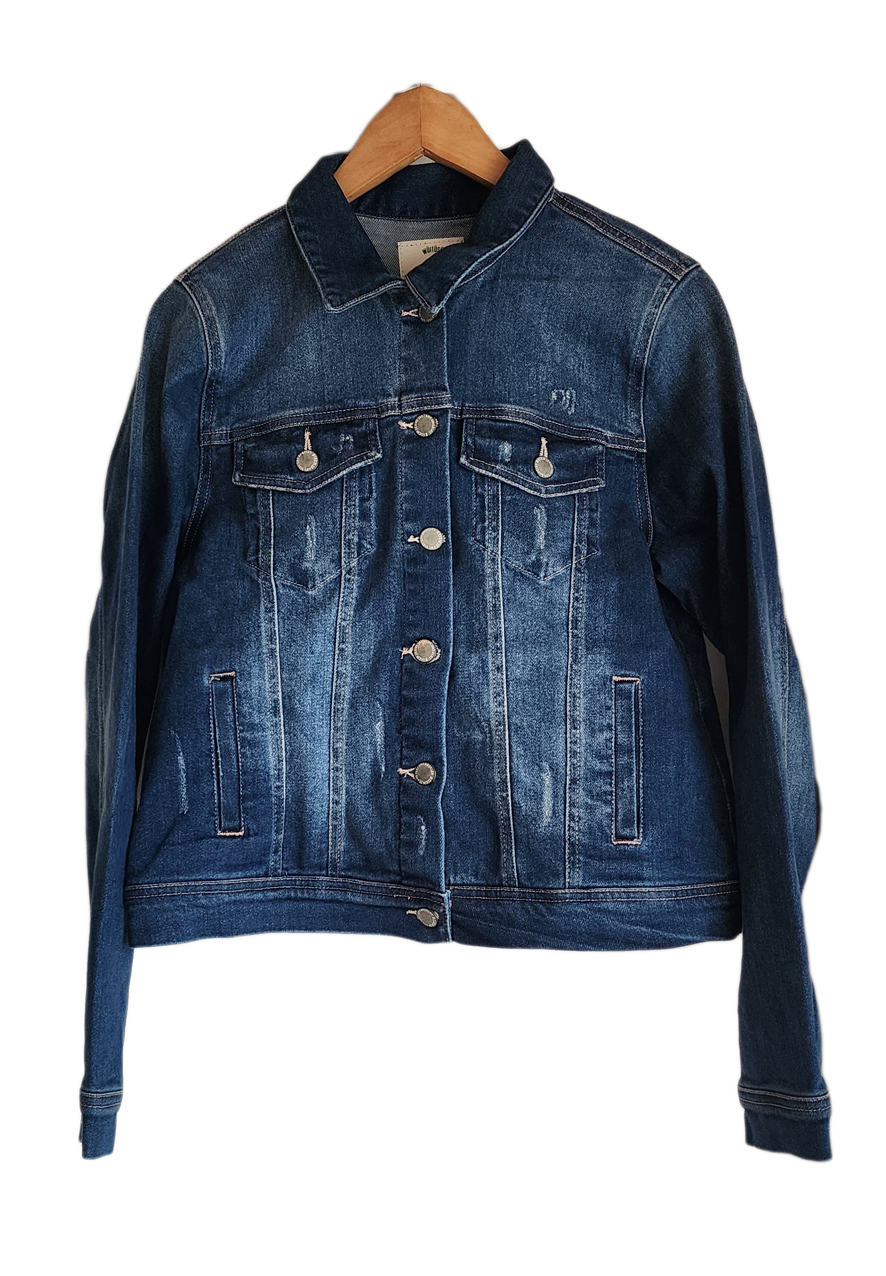 "Handcrafted denim jacket with vibrant, artisan-made punch needle embroidery on the back, showcasing unique style and craftsm