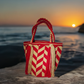 "Handcrafted Wuitusu Wayuu Waterfall Purse featuring vibrant crochet patterns, elegant cascading threads, and artisanal Wayuu