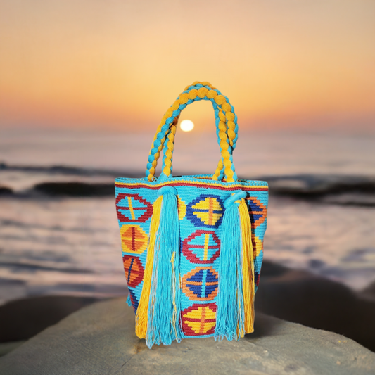 "Handcrafted Wuitusu Wayuu Waterfall Purse with vibrant, cascading design and intricate Wayuu patterns, showcasing cultural a