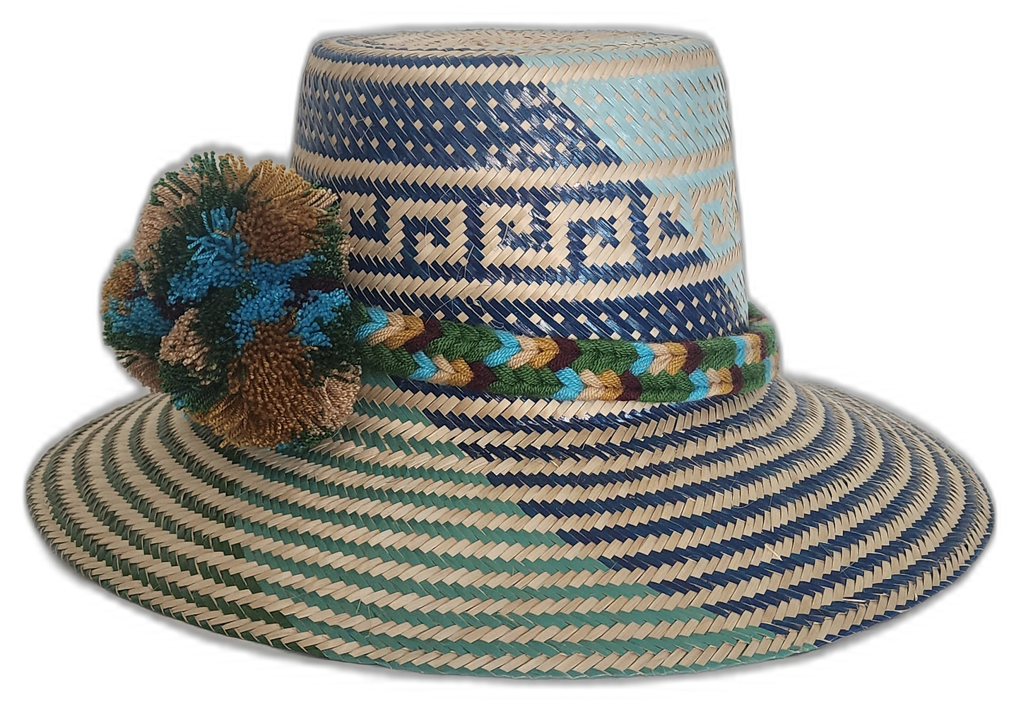 Colorful Wayuu hat in green and blue tones with woven crown and soft pompom details