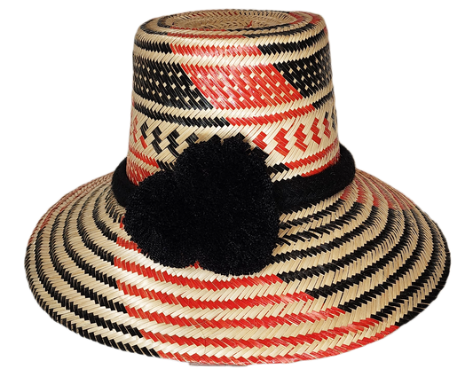 "Handmade Artisan Wayuu hat crafted from Iraca palm fibers, adorned with colorful pompoms, adjustable for various styles."