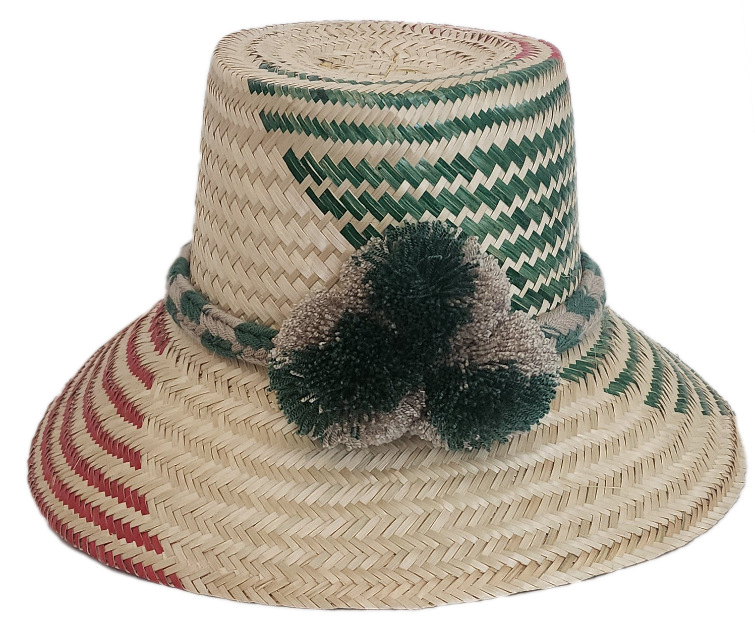 Wayuu handmade straw hat with green and red weave, neutral braided band, and soft pom-poms — artisan-crafted.