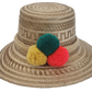 This handmade Wayuu hat brings color to sunny days with bold pom-poms and a natural braided band. Lightweight and perfect for bohemian summer looks.