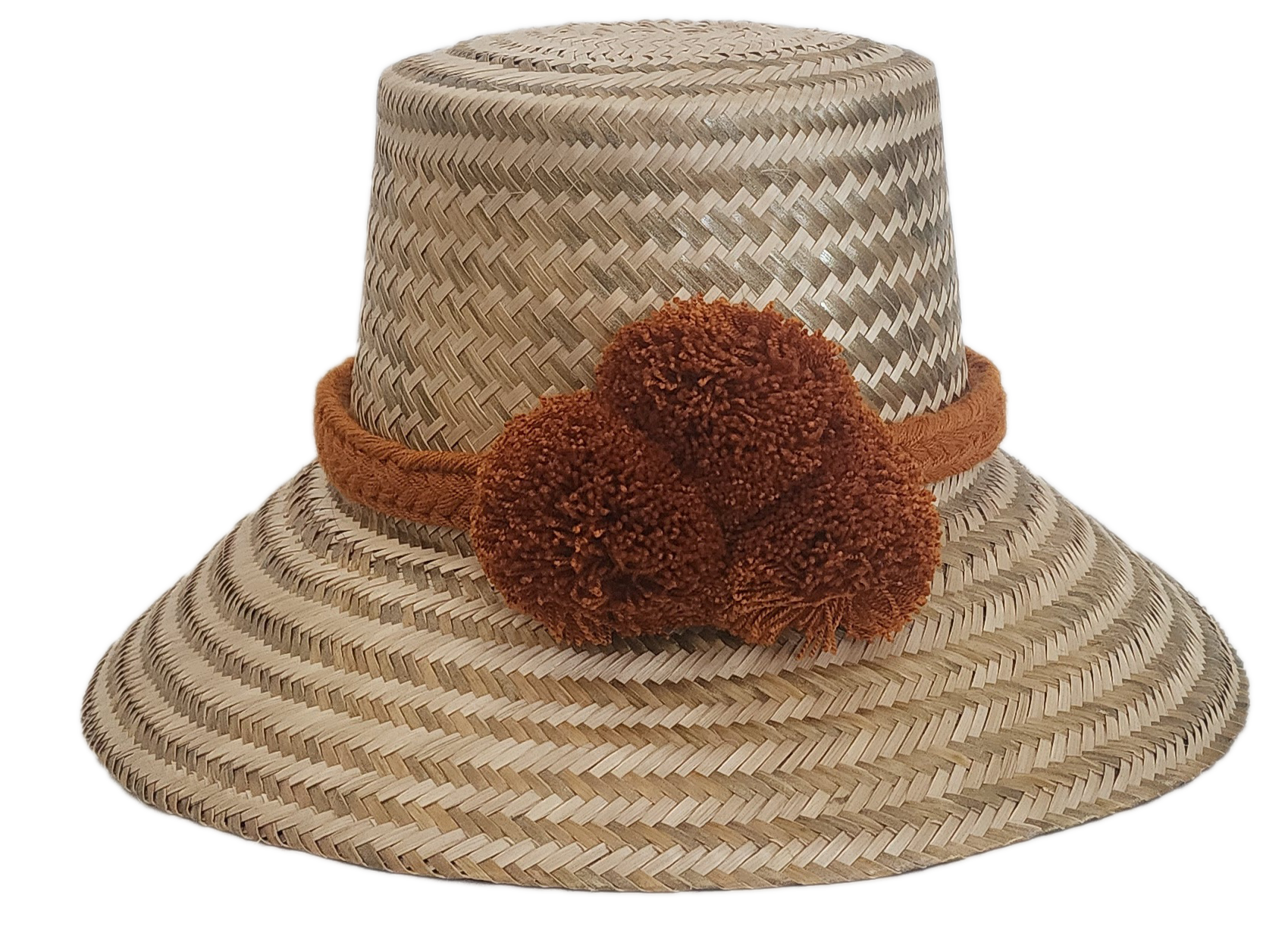 Wayuu handmade straw hat with solid brown braided band and pom-poms — a chic, boho-inspired summer accessory.