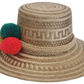 Wayuu artisan straw hat with trio of bright pom-poms in primary colors — minimalist boho style.