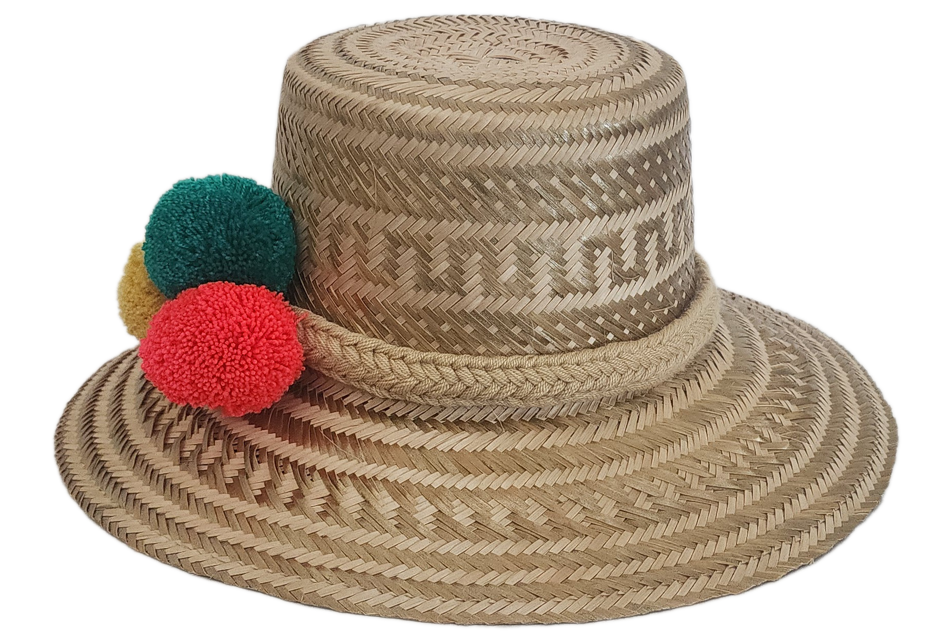 Wayuu artisan straw hat with trio of bright pom-poms in primary colors — minimalist boho style.