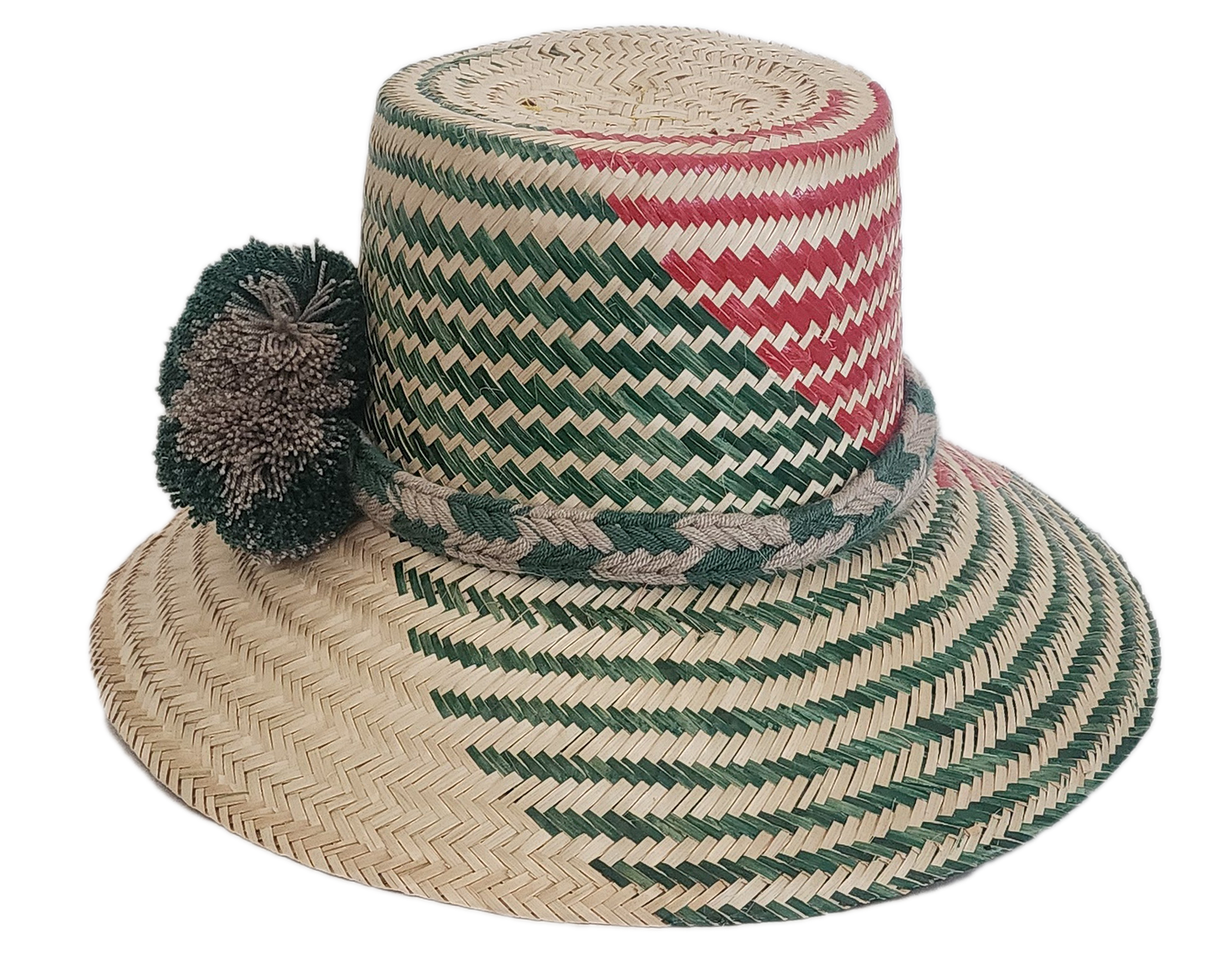 Bohemian Wayuu straw hat with forest green and clay red pattern and muted tone pom-poms.