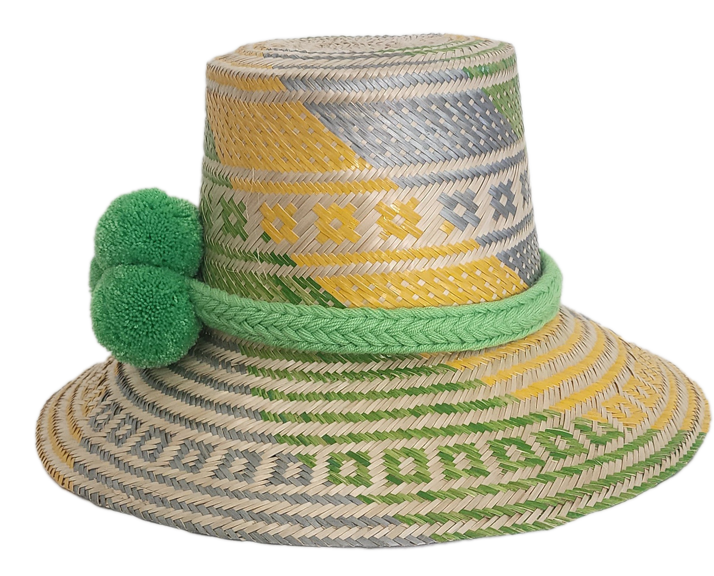 Handwoven Wayuu straw hat with green, yellow, and gray tribal patterns, wide brim, and bright green pom-pom band. A bold, bohemian summer accessory.