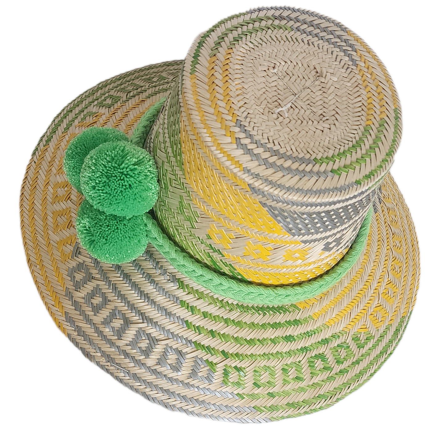 Handwoven Wayuu straw hat with green, yellow, and gray tribal patterns, wide brim, and bright green pom-pom band. A bold, bohemian summer accessory.