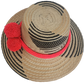 Bohemian straw hat with red yarn pom-poms and black tribal weave — handmade by Wayuu artisans.
