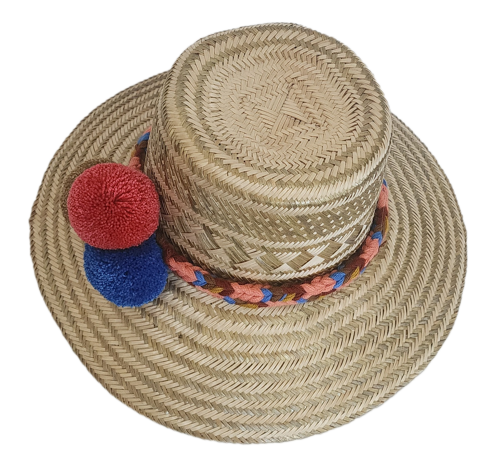 Artisan-crafted Wayuu straw hat with colorful handwoven band and decorative pom-poms — bohemian and eco-friendly.