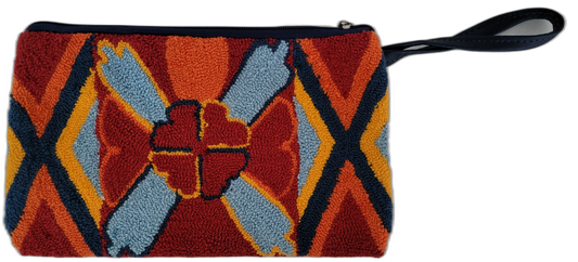 Rylie bohemian clutch with bold geometric punch needle design in warm colors

