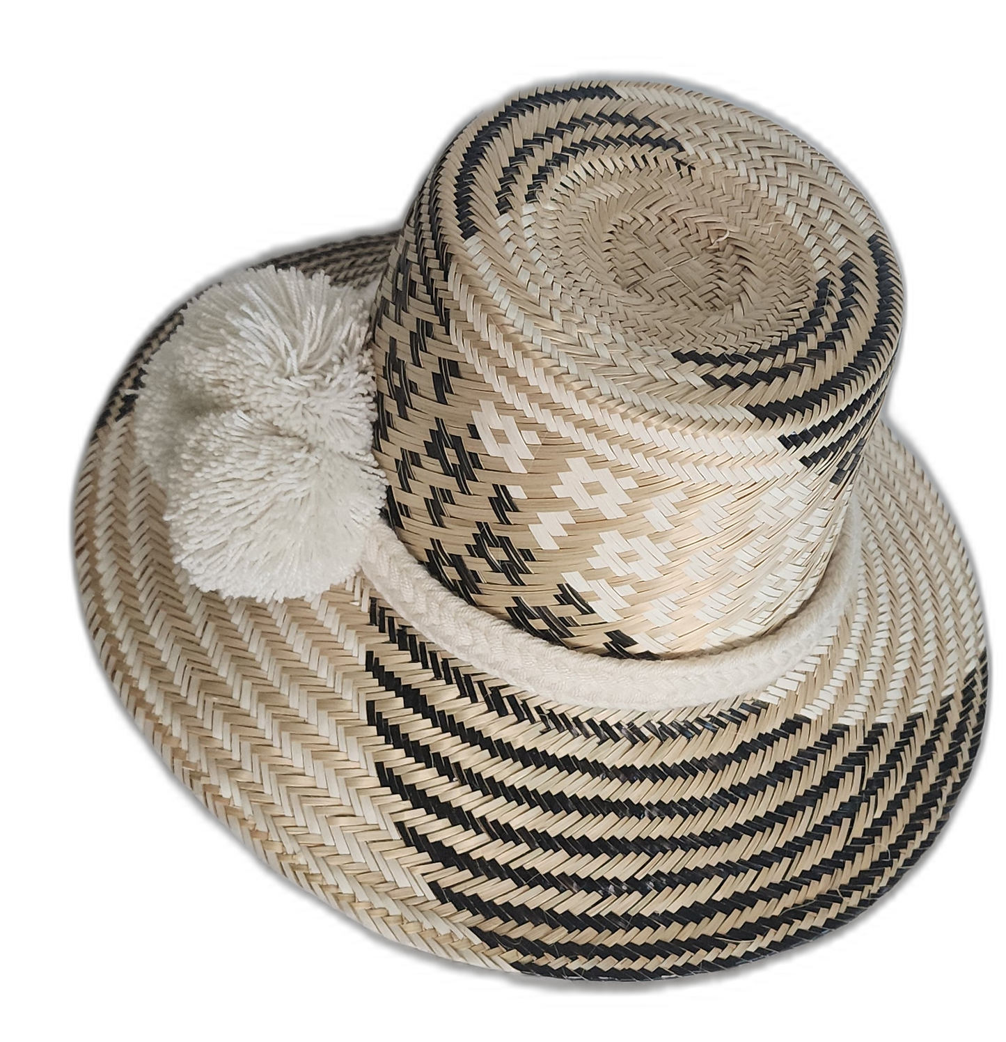 Boho chick hat handcrafted by Wayuu artisans with natural Iraca palm and monochrome woven design